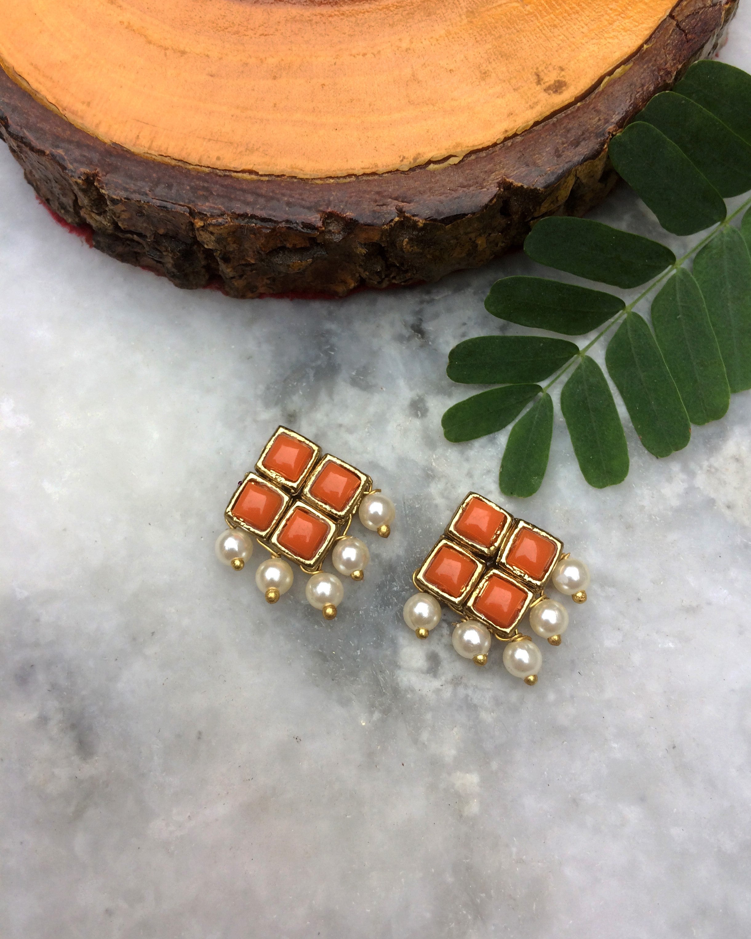 Orange stud online earrings